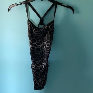 Size 30 Arena swim suit, never worn, took tags off but comes with the box.